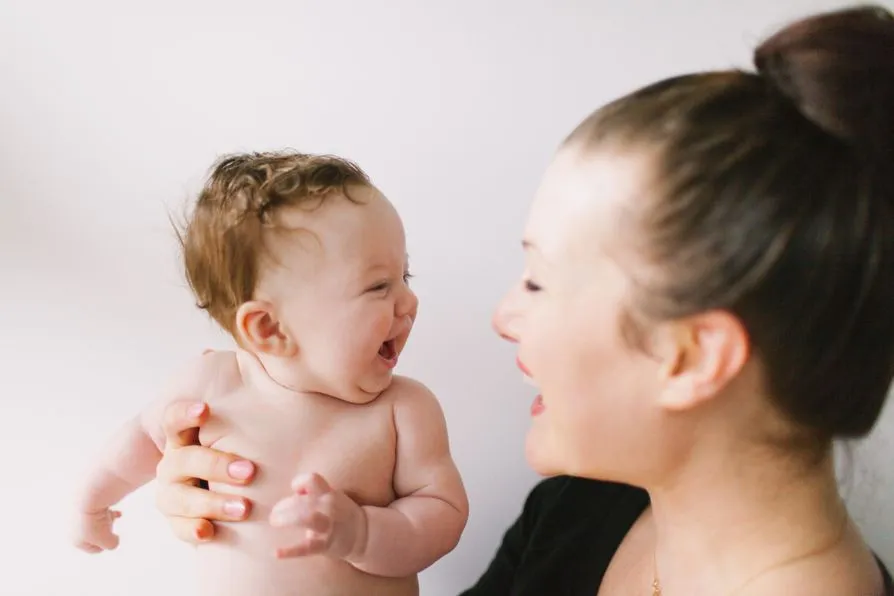 Mother child laughter joy