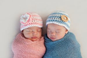 Newborn girl and boy